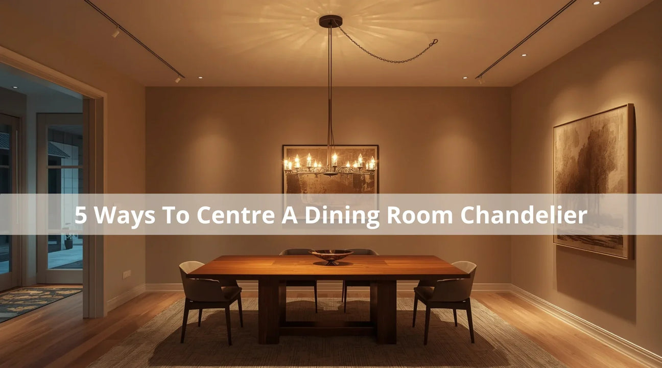 Elegant dining room featuring a wooden table, chairs, and a stylish chandelier, highlighted by warm lighting and soft decor.