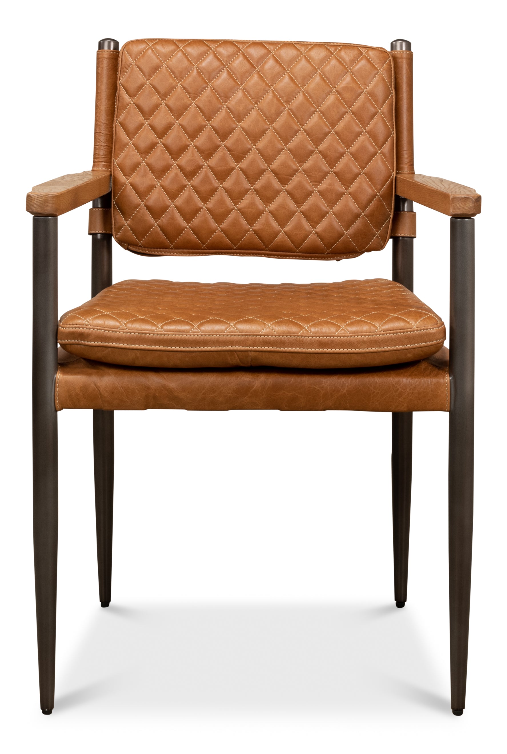 Brown quilted leather dining chair with upholstered seat and back, dark wood legs, and slim armrests isolated on white background