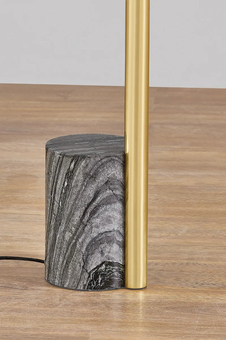 Haskell Sconce: A modern, industrial wall light with a metallic dome shade and a slender, curved arm.