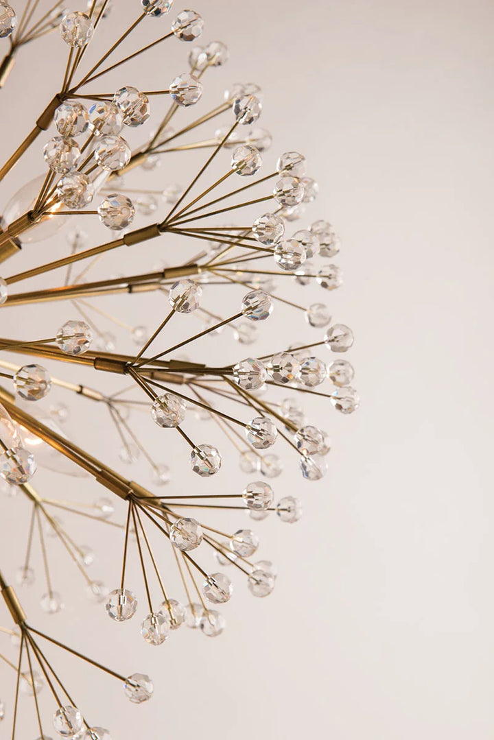 Close up of brass sputnik chandelier with crystal bead tips, modern starburst ceiling light fixture detail