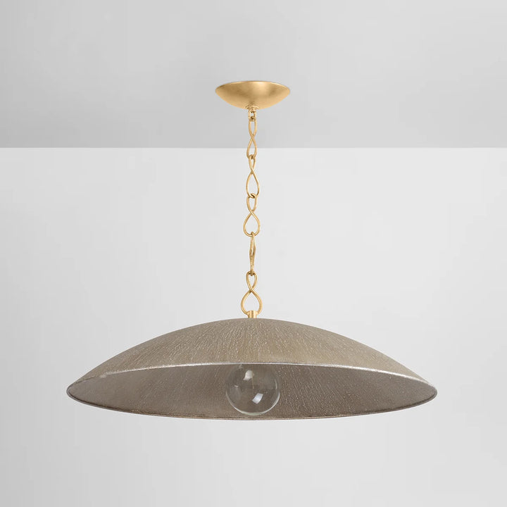Modern dome pendant light with antique brass chain, wide textured metal shade, and exposed globe bulb on white background