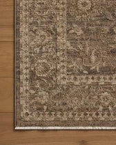 Patterned rug on a wooden floor