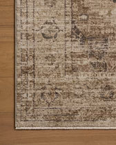 Close-up of a patterned rug on a wooden floor