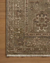 Close-up of a patterned rug on a wooden floor