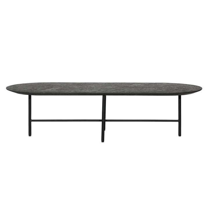 An oval-shaped coffee table with a black metal base and a textured plaster cement finish.