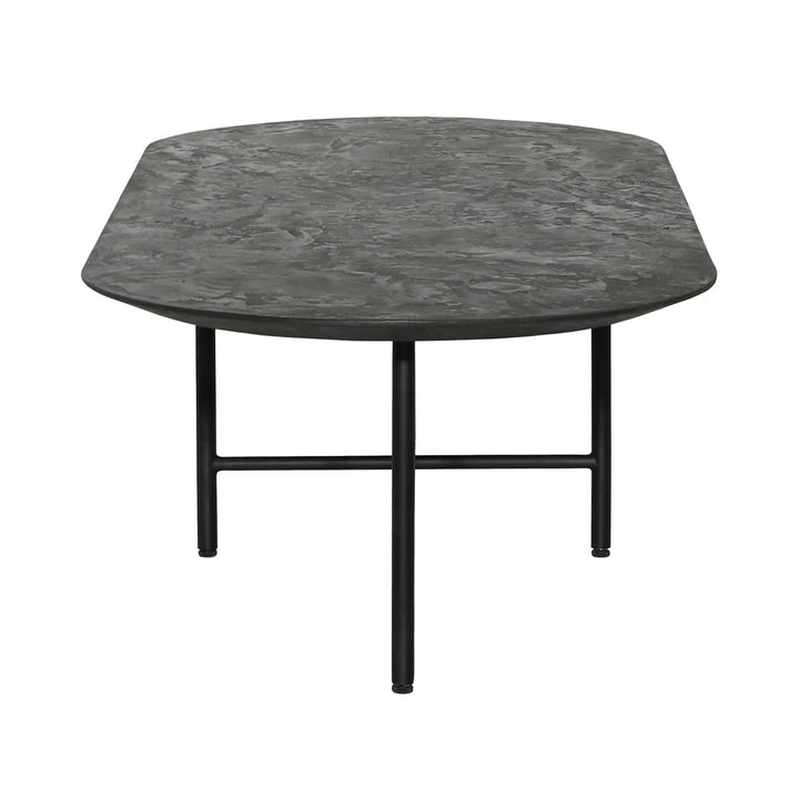 Charcoal black octagon coffee table with textured stone-look top and slim metal legs, modern accent table isolated on white background