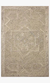 Beige area rug with geometric pattern on a plain background