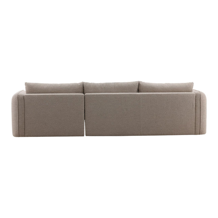 Back view of beige sectional sofa with clean modern lines and textured upholstery, isolated on white background