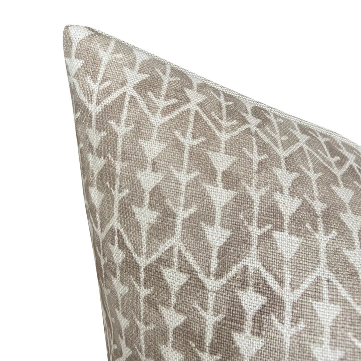 Patterned pillow with a geometric design on a white background