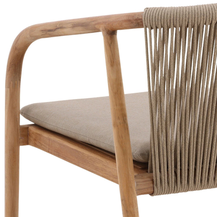 Wood armchair close up with rope woven back and cushion seat