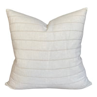 White textured pillow on a white background