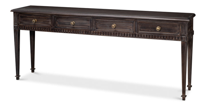 Dark wood console table with four drawers, brass knob pulls, and carved apron detail, traditional entryway table isolated on white background