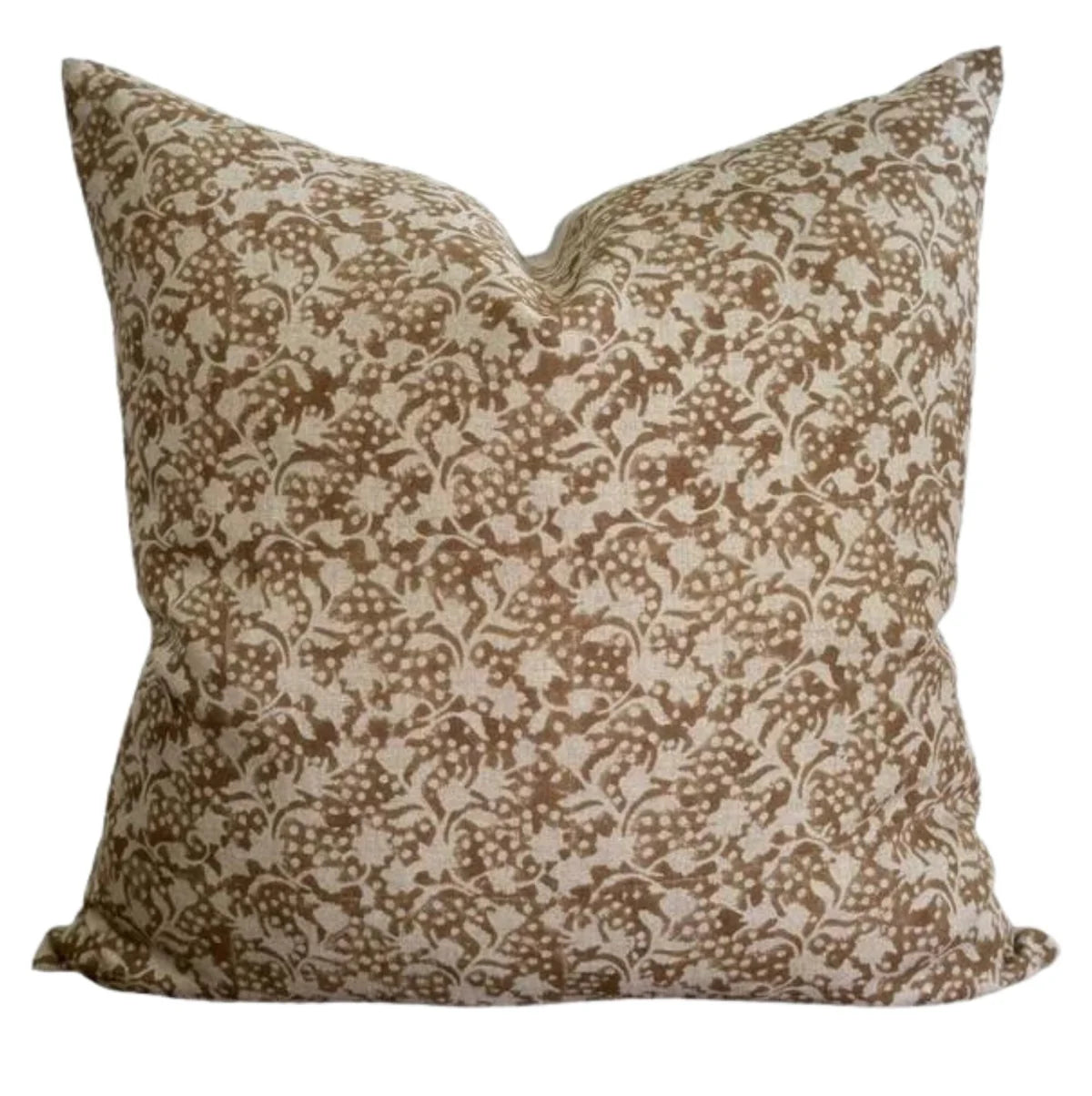 Decorative pillow with brown and beige floral pattern on a white background