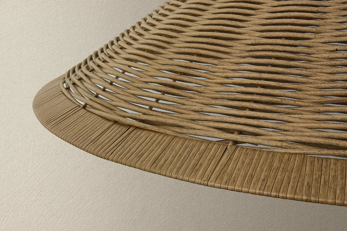 Close-up of a woven wicker chair seat on a neutral background