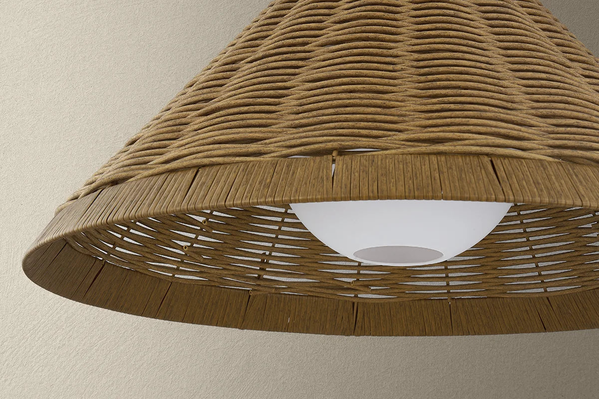 Wicker lampshade on a neutral background