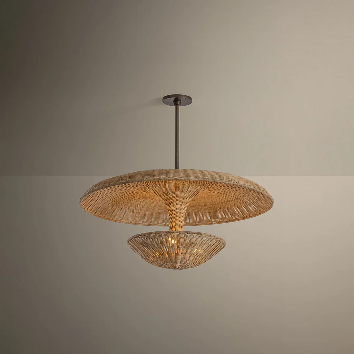 Woven pendant light fixture on a neutral background