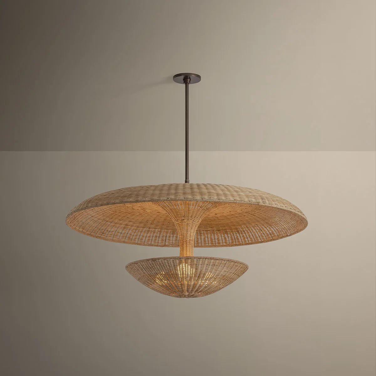 Woven pendant light fixture on a neutral background