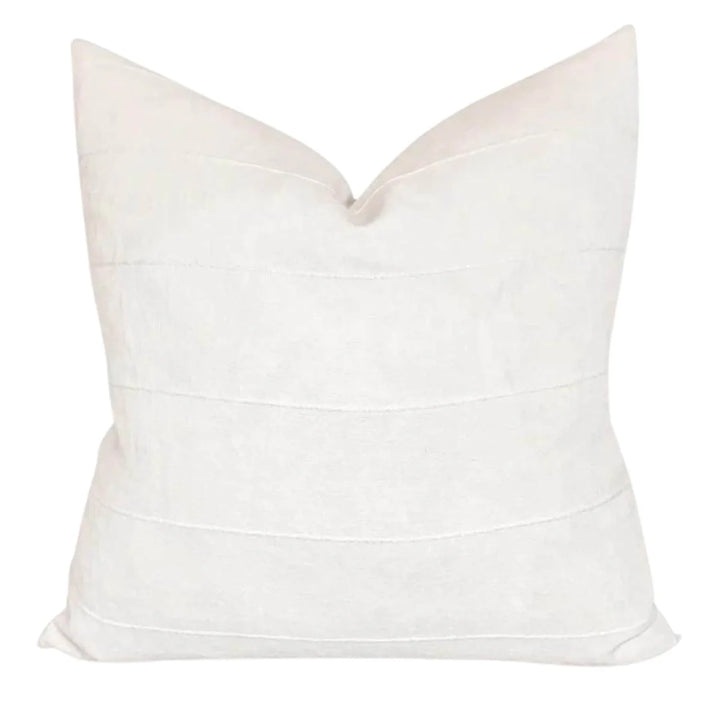 White pillow with ruched texture on a white background