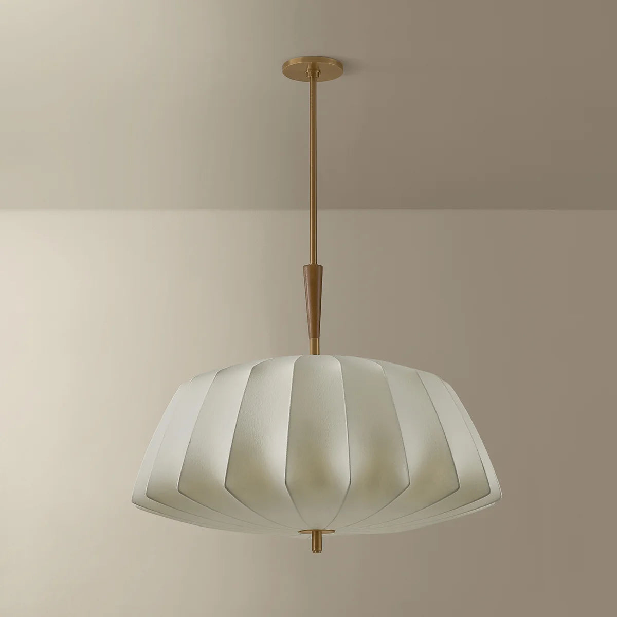 Ceiling light fixture with striped design on a neutral background