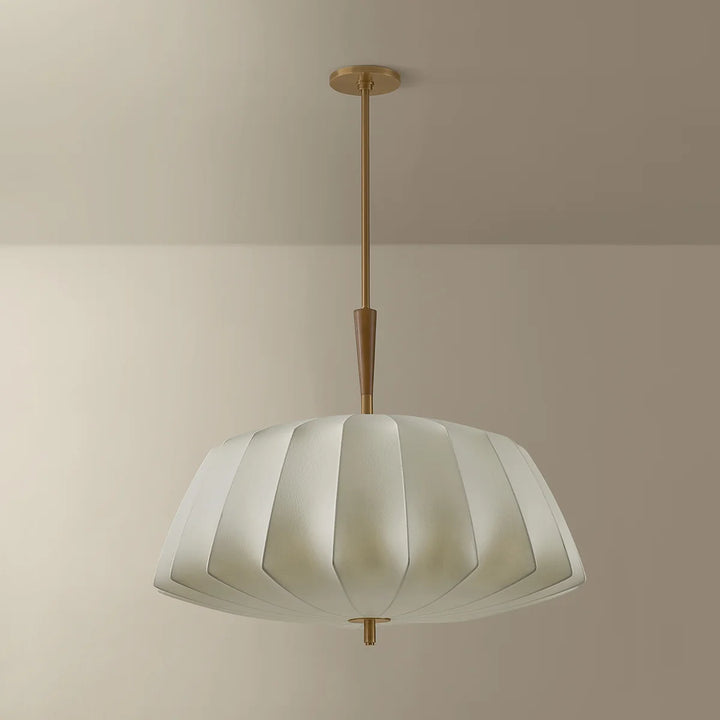 Ceiling light fixture with striped design on a neutral background