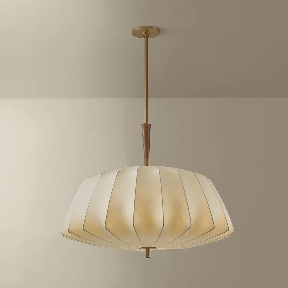 Ceiling light fixture with striped lampshade on a neutral background