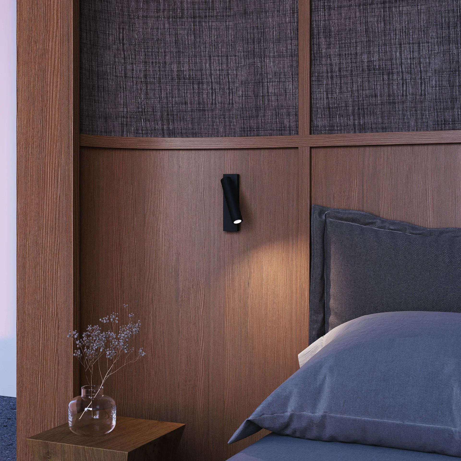 Bedroom with wooden headboard, nightstand, and pillows