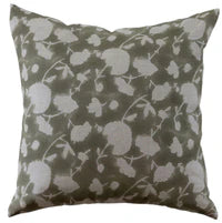 Decorative pillow with floral pattern on a plain background