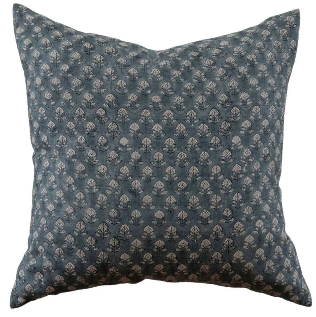 Decorative pillow with a blue and white pattern on a white background
