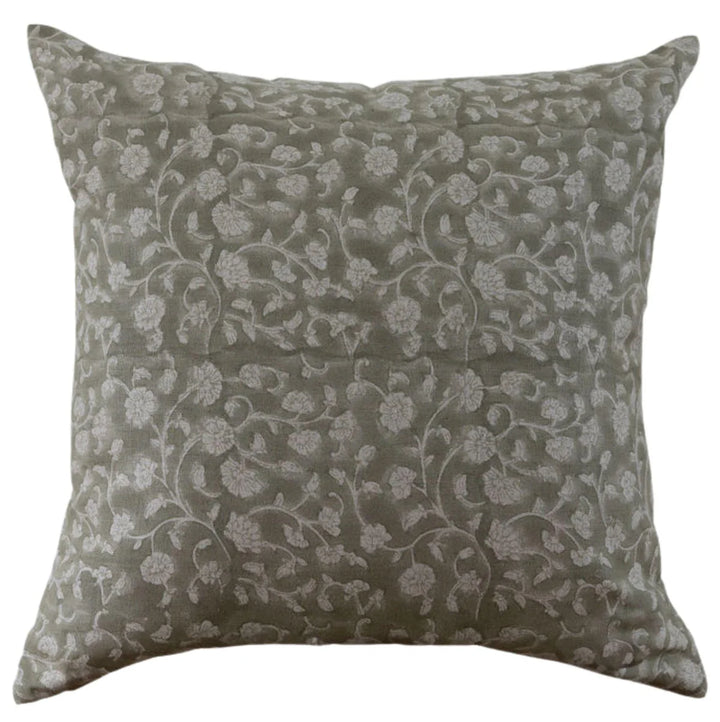Decorative pillow with floral pattern on a plain background