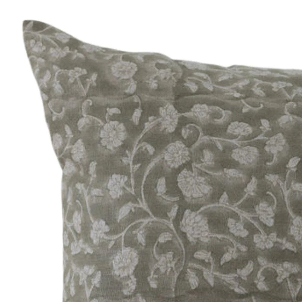 Floral patterned pillow on a white background