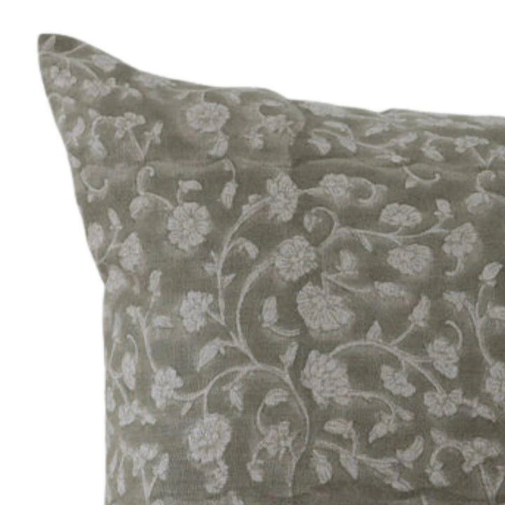 Floral patterned pillow on a white background