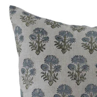 Decorative pillow with floral pattern on a beige background
