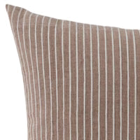 Close-up of a striped pillow with brown and white lines.