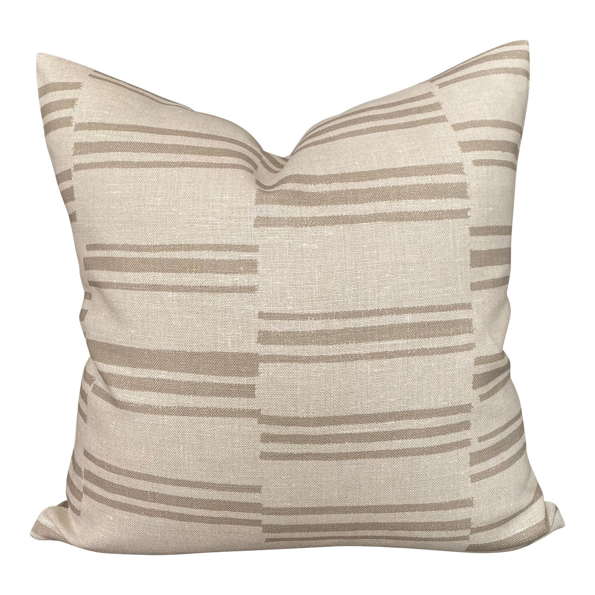 Beige pillow with striped pattern on a white background