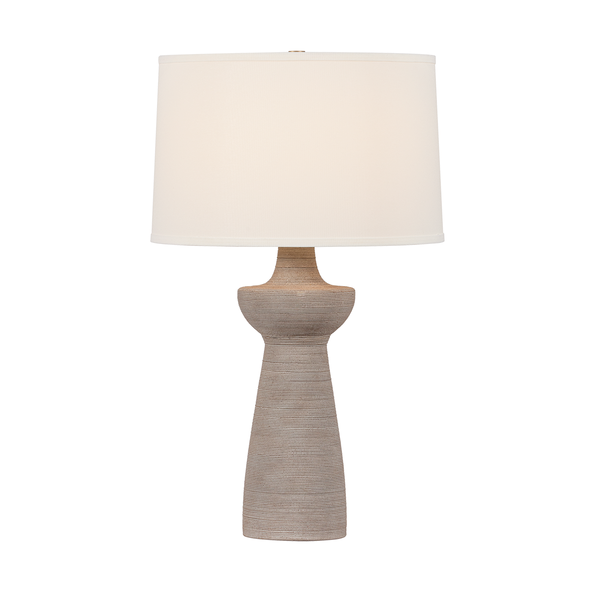Table lamp with a beige base and white shade on a white background