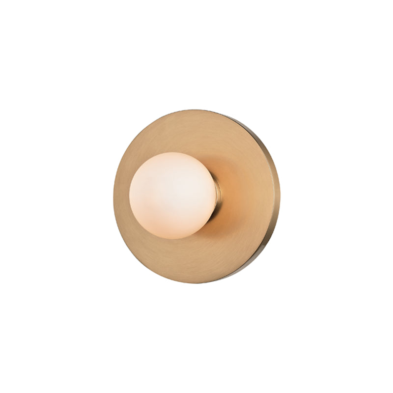 Round wall light fixture with gold metallic finish on a white background