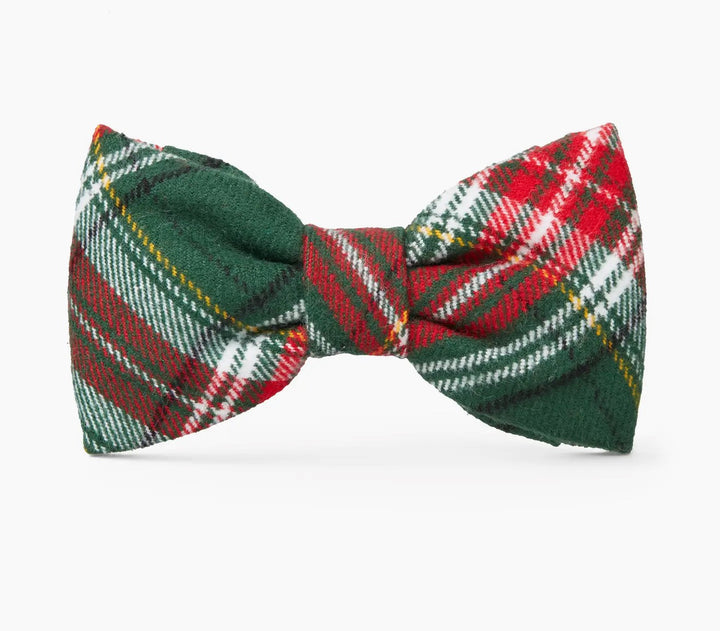 Plaid bow tie with green, red, and white pattern on a white background